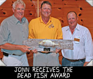JONN RECEIVES THE DEAD FISH AWARD FROM JERRY DRIESSEN & DON LADUBEC
