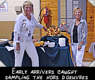 Early arrivers caught sampling the hors d'oeuvres